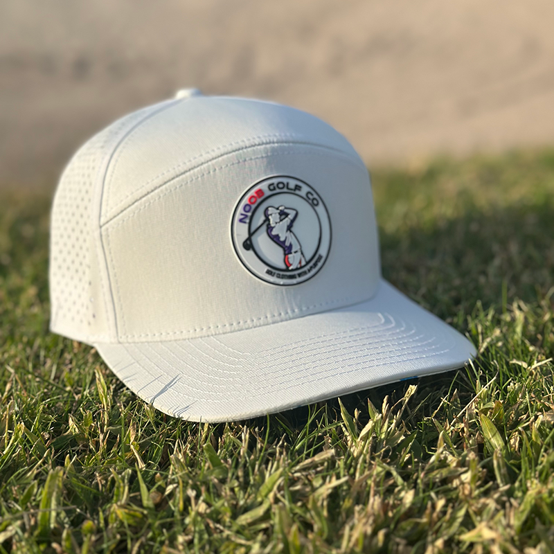 Stylish white Founders Cap with HydroDri tech, a waterproof golf hat featuring a wide brim for sun and rain protection.