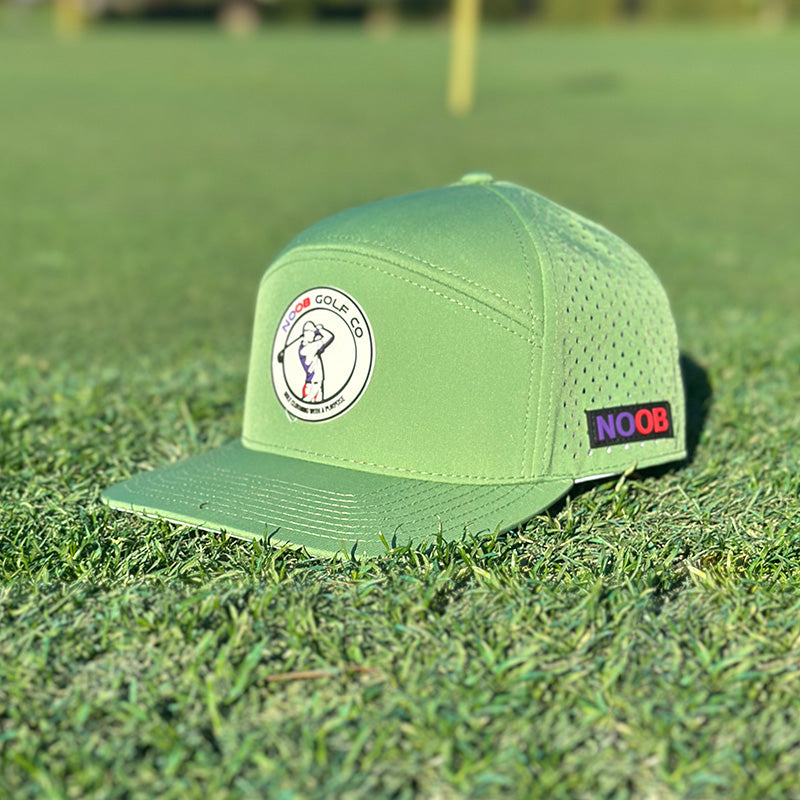 Stylish green Founders Cap with a wide brim, designed as a waterproof golf hat using HydroDri technology for all-weather protection.
