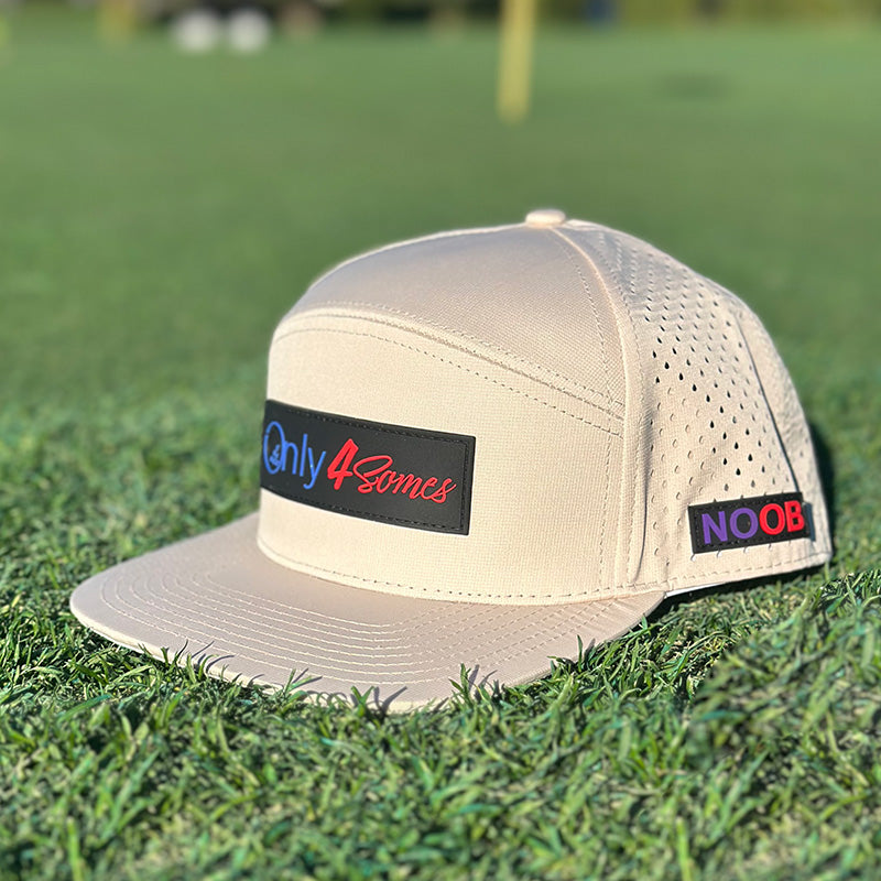 Stylish tan golf hat with a wide brim, crafted for waterproof protection and breathable comfort during any weather.